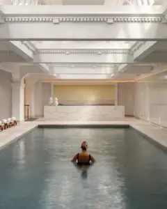 Guest enjoying the indoor wellness pool at Capella Sydney, an award-winning luxury hotel located within Sydney's historic Sandstone Precinct.