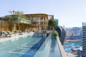 Artist impression of Florin Hotel Sydney's rooftop infinity pool overlooking Darling Harbour and the Sydney CBD skyline.