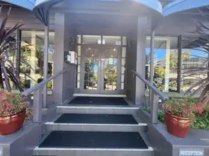 Entrance to Leura Gardens Resort surrounded by landscaped gardens in the heart of the Blue Mountains, New South Wales.