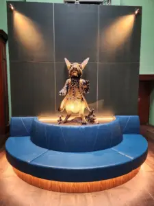 Whimsical rabbit sculpture inside The ArtHouse Hotel Sydney, inspired by Wonderland themes and surrounded by the venue's heritage architecture and contemporary design.