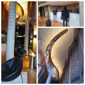 Modern lobby and reception area at Vibe Hotel Adelaide featuring contemporary architecture, stylish interiors and welcoming guest spaces.