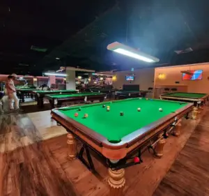Pool tables inside Empire Bar & Pool Lounge in Adelaide, showcasing the venue's social gaming atmosphere, professional tables and entertainment spaces.