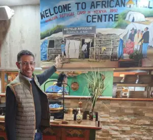 Owner Mohamed Beyan at African Village Restaurant in Torrensville, sharing the story of his journey from a refugee camp in Kenya to building a successful Ethiopian restaurant in Adelaide.