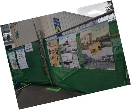 Community information boards displayed on construction fencing during Melbourne Water sewer upgrade works in Williamstown, featuring historical photographs, project information and local heritage storytelling.